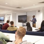 Optimized-compr university-students-study-in-a-classroom-with-P827YTH-min